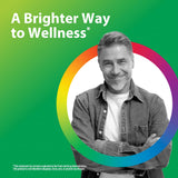 Middle-aged man smiling with arms crossed, encircled by a rainbow, promoting Astaxanthin.