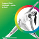 A woman in activewear performs a yoga pose indoors, demonstrating flexibility and balance in a serene setting.