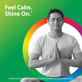 Young adult man meditating with closed eyes and hands in prayer pose, promoting Magnesium 10 Complex for relaxation.