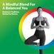 Young woman in yoga tree pose with hands in prayer position, meditating for Mucuna Ashwagandha benefits.