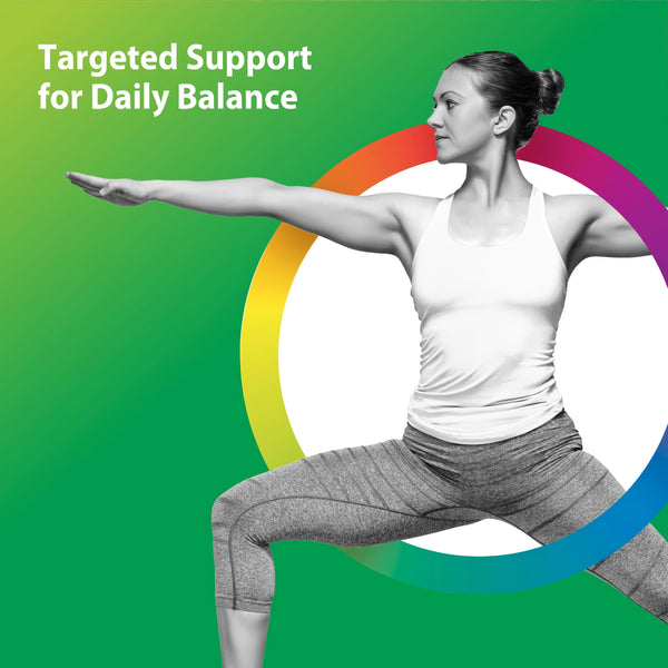 Young adult woman in Warrior II yoga pose demonstrating the use of a probiotic powder in a lifestyle setting.