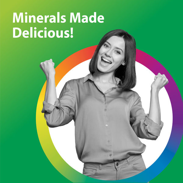 Smiling young woman celebrating the delicious taste of Colloidal Minerals.