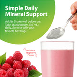 Product highlights graphic stating Simple Daily Mineral Support: shake well, take 2 tbsp (30 mL) daily with beverage, Raspberry Flavor.